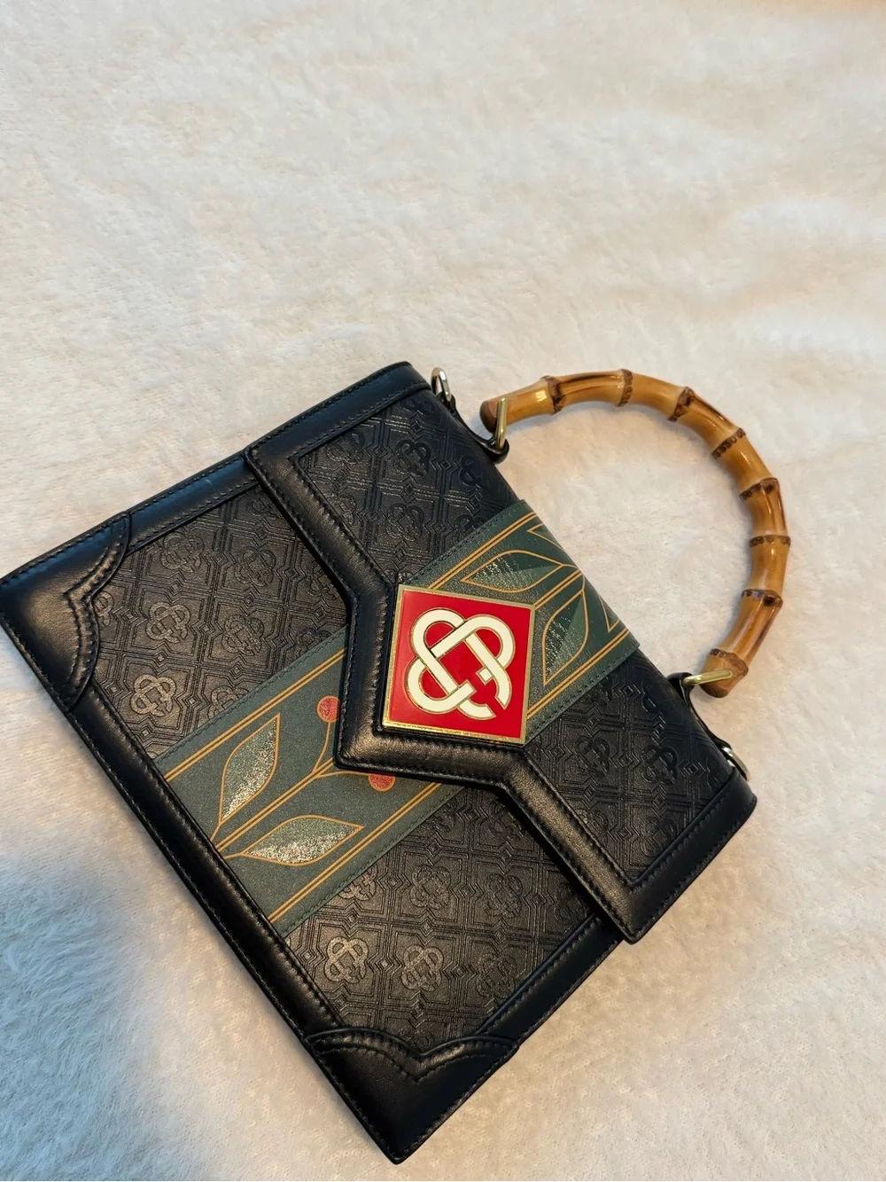 Black Satchel with Bamboo Top Handle and Green-Gold Stripe Accent